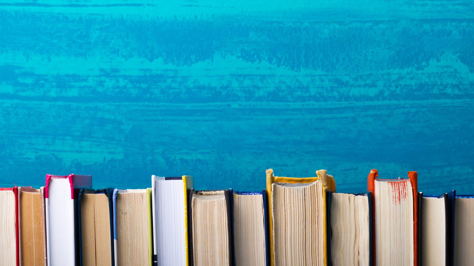 Books on wooden desk table